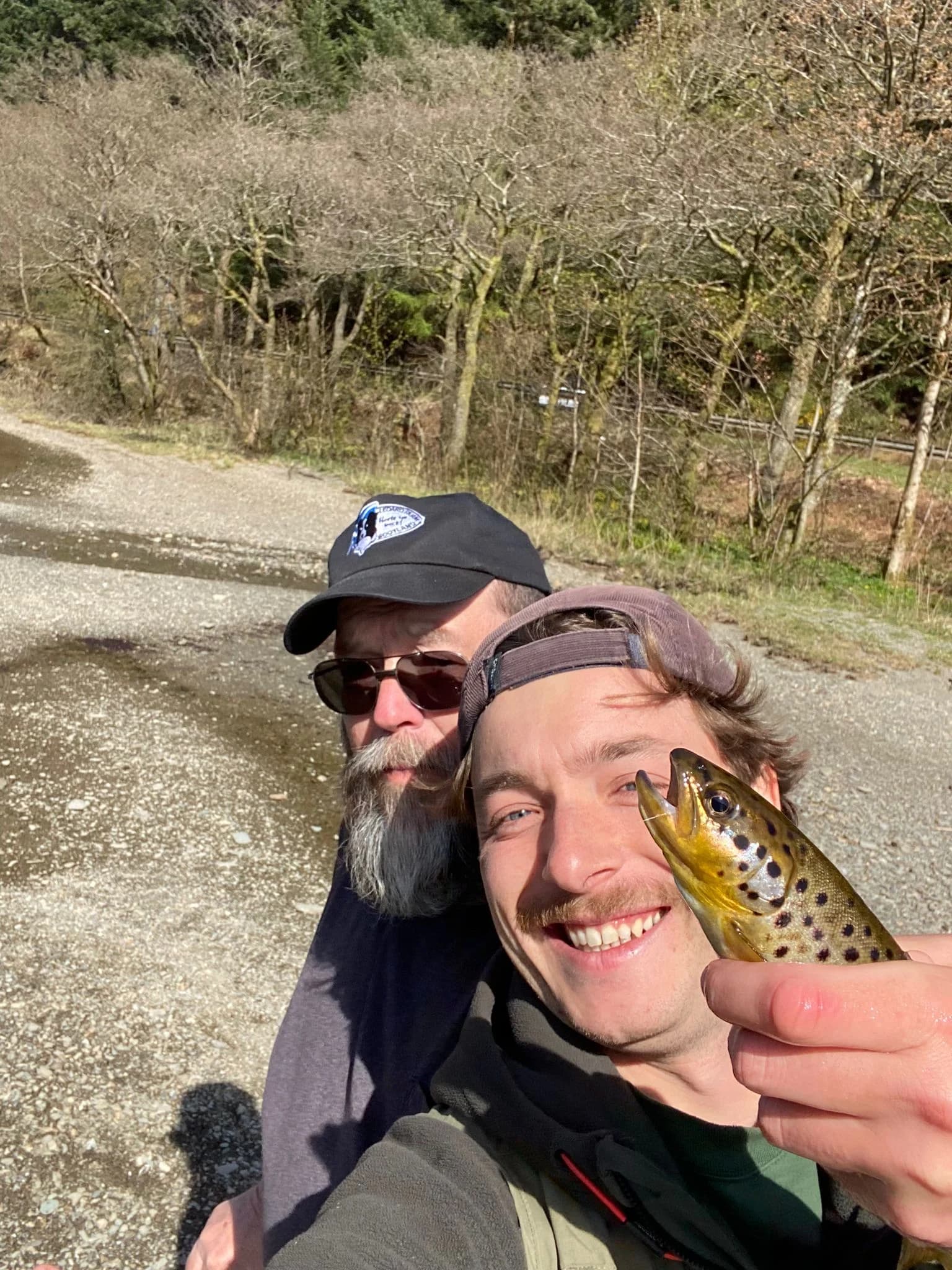 A fishing-day selfie with a trout from Eric and Charlyn’s anniversary trip