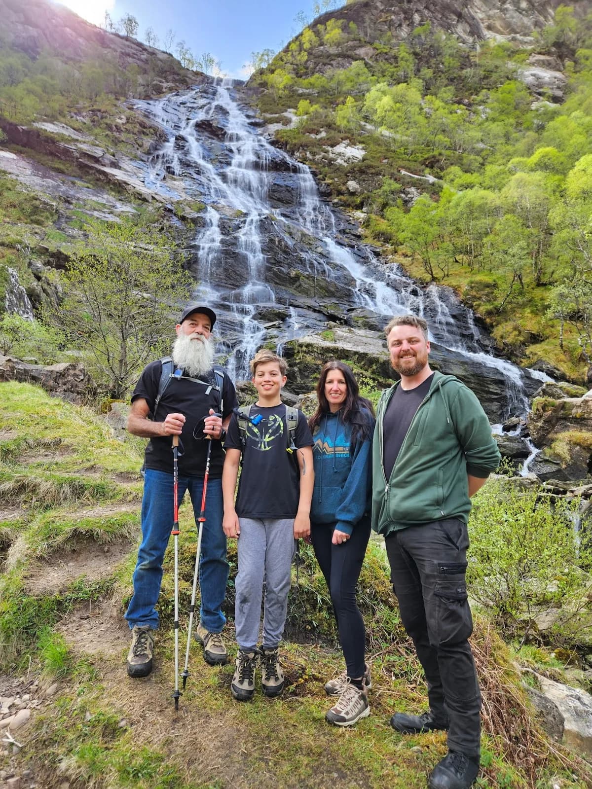 The McCormick family and their guide beside a Highland waterfall