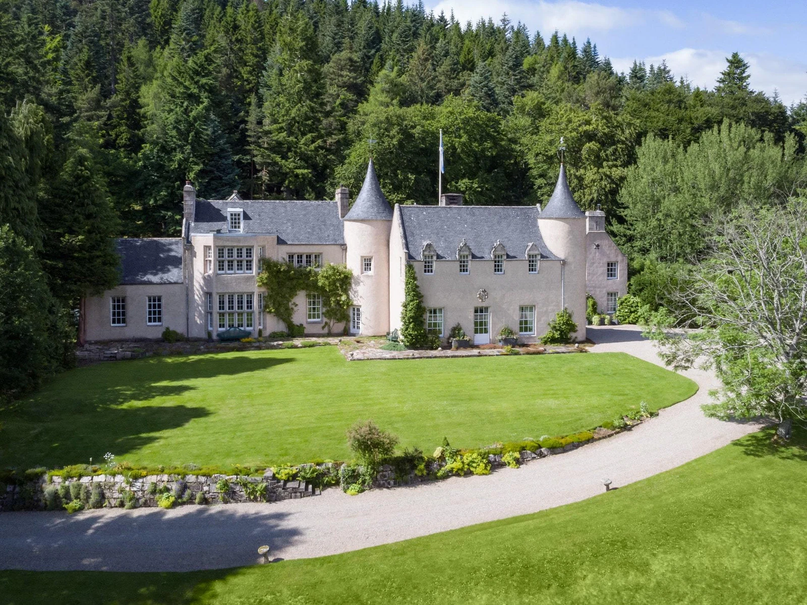 Candacraig House surrounded by woodland in the Cairngorms